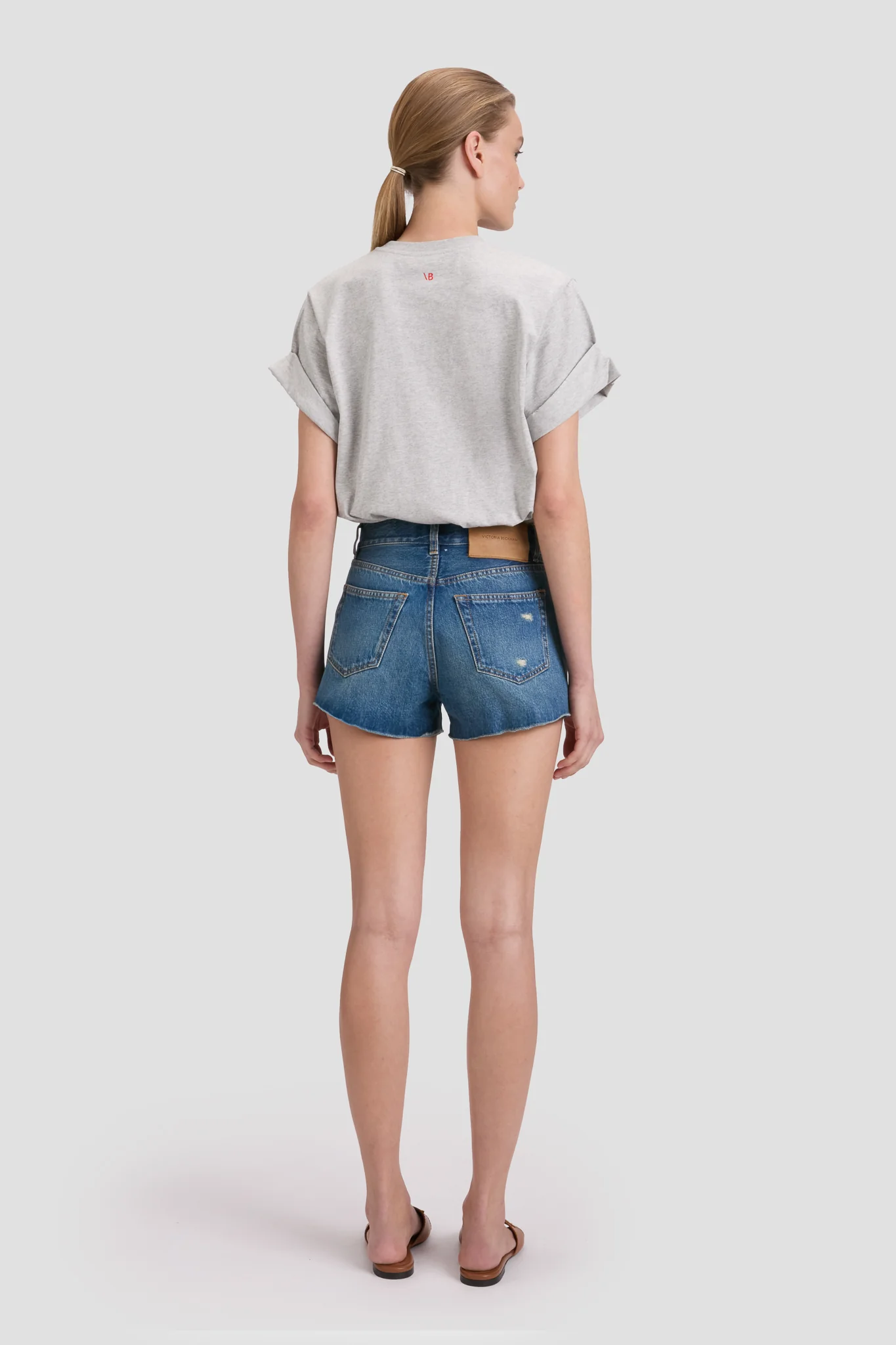 Distressed Shorts In Mid Blue Wash - Image 4